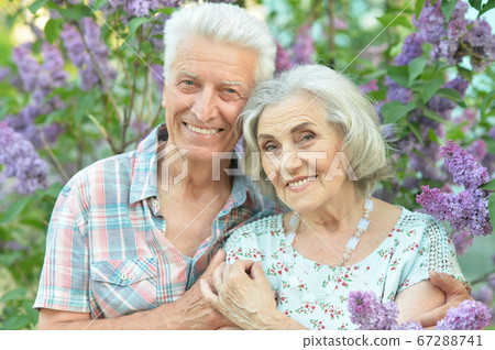 Close up portrait of beautiful senior couple hugging Close up portrait of beautiful senior couple hugging 67288741