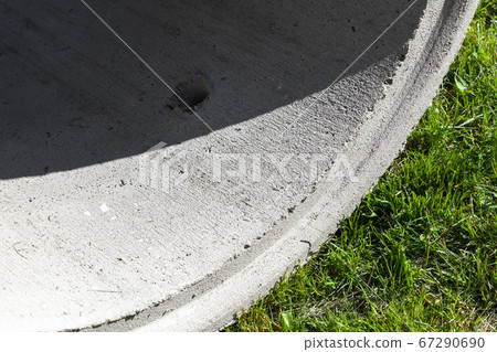 Massive concrete ring with strong shadow Massive concrete ring with strong shadow 67290690