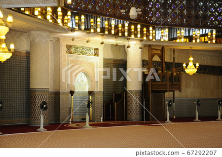 KUALA LUMPUR, MALAYSIA -FEBRUARY 2014: Malaysia National Mosque a.k.a Masjid Negara on February 15, 2014 at Kuala Lumpur, Malaysia. It was built in 1965 and has a capacity of 15,000 people KUALA LUMPUR, MALAYSIA -FEBRUARY 2014: Malaysia National Mosque a.k.a Masjid Negara on February 15, 2014 at Kuala Lumpur, Malaysia. It was built in 1965 and has a capacity of 15,000 people 67292207