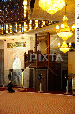 KUALA LUMPUR, MALAYSIA -FEBRUARY 2014: Malaysia National Mosque a.k.a Masjid Negara on February 15, 2014 at Kuala Lumpur, Malaysia. It was built in 1965 and has a capacity of 15,000 people KUALA LUMPUR, MALAYSIA -FEBRUARY 2014: Malaysia National Mosque a.k.a Masjid Negara on February 15, 2014 at Kuala Lumpur, Malaysia. It was built in 1965 and has a capacity of 15,000 people 67292249