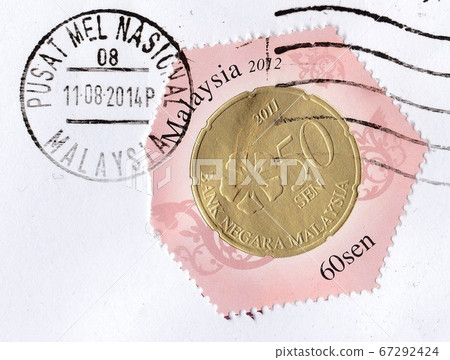 MALAYSIA, KUALA LUMPUR -AUGUST 2014: Malaysian stamp with the RM0.50 money image. Circa 2012. MALAYSIA, KUALA LUMPUR -AUGUST 2014: Malaysian stamp with the RM0.50 money image. Circa 2012. 67292424
