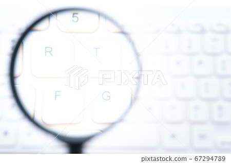 Search image PC keyboard and magnifying glass 67294789