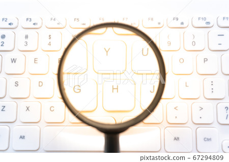 Search image PC keyboard and magnifying glass 67294809