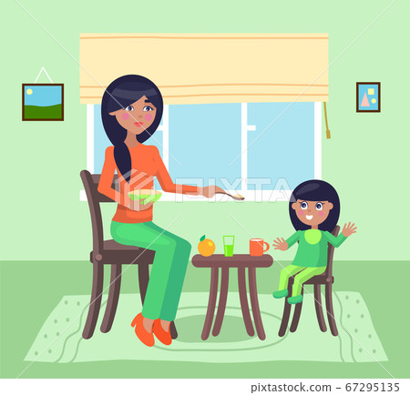 Mother feeding her daughter with a spoon with poridge, little girl having fun or rejoice, smiling Mother feeding her daughter with a spoon with poridge, little girl having fun or rejoice, smiling 67295135