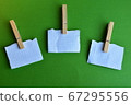 Three sheets for writing on three clothespins 67295556