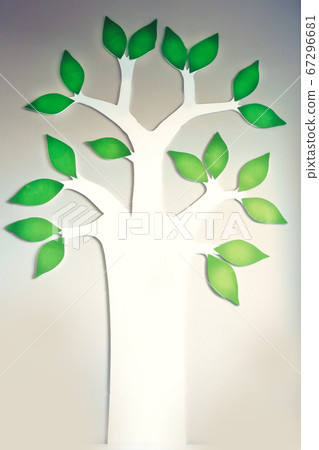 Image of Tree with green leaves with people, family tree or business tree concept on wall background Image of Tree with green leaves with people, family tree or business tree concept on wall background 67296681