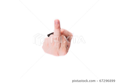 Middle Finger Man through a hole in paper on a white background isolate. close up, copy space. 67296899