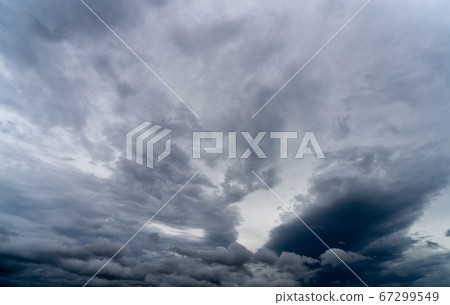 Heavy rain clouds and dark sky background material 67299549