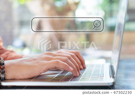 People hand using laptop or computor searching for People hand using laptop or computor searching for 67302230