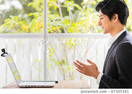Young business man having a video call 67305381