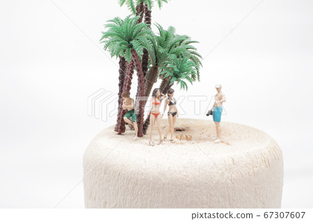 a tiny people wearing swimsuit relaxing on a tiny people wearing swimsuit relaxing on 67307607