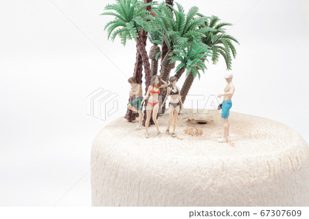 a tiny people wearing swimsuit relaxing on a tiny people wearing swimsuit relaxing on 67307609