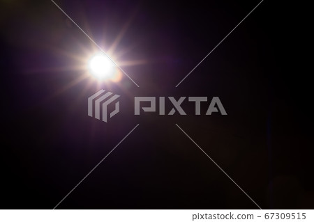 Abstract Natural Sun flare on the black Abstract Natural Sun flare on the black 67309515