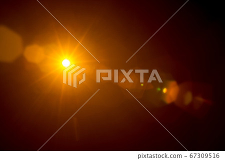 Abstract Natural Sun flare on the black Abstract Natural Sun flare on the black 67309516