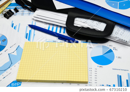 business office desk closeup - financial reports, business office desk closeup - financial reports, 67310210