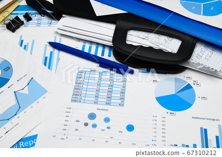 business office desk closeup - financial reports, business office desk closeup - financial reports, 67310212