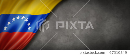 Venezuelan flag on concrete wall banner Venezuelan flag on concrete wall banner 67310849