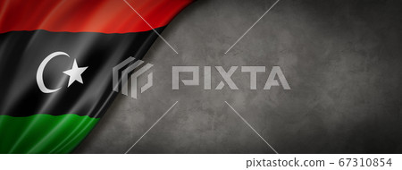 Libyan flag on concrete wall banner Libyan flag on concrete wall banner 67310854