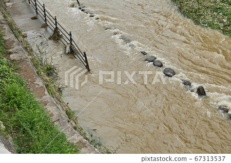 Flooded river submerged Flooded river submerged 67313537