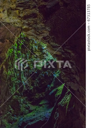 Cave in an extinct volcano on the island of Terceira Gruta do Algar do Carvao. Azores, Portugal Cave in an extinct volcano on the island of Terceira Gruta do Algar do Carvao. Azores, Portugal 67313785