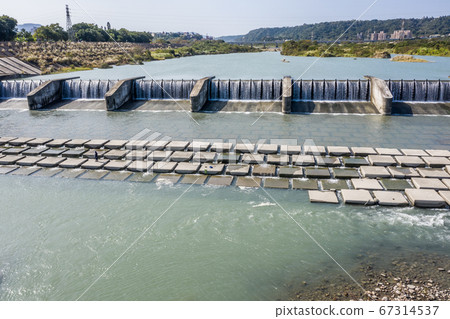 small dam in the daytime small dam in the daytime 67314537