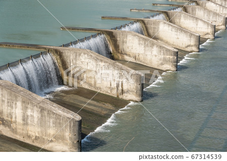 small dam in the daytime small dam in the daytime 67314539