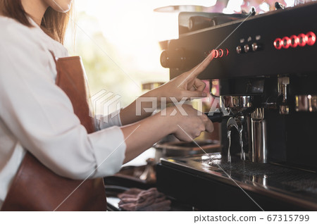 Close up image of barista preparing coffee at cafe 67315799