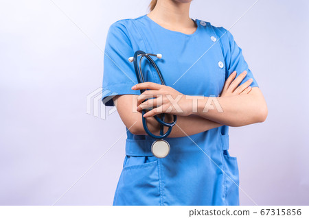 Portrait of smiling Asian nurse with stethoscope isolated on white background Portrait of smiling Asian nurse with stethoscope isolated on white background 67315856