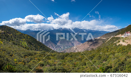 Meili snow mountain in background in Deqen, Shangri-la country, Yunnan province, China Meili snow mountain in background in Deqen, Shangri-la country, Yunnan province, China 67316042