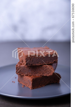 Brownie cake. Homemade Chocolate Dessert. A popular dark chocolate cake. Close-up, place for text. 67316690