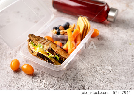 Close up of vegan school lunch box with sandwich, 67317945