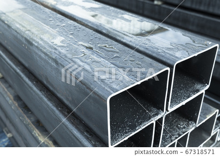 Stack of rolled metal products, wet steel pipes 67318571