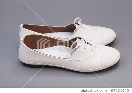 White Shoes isolated on gray background 67321940