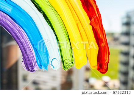 A rainbow painted on a window. Gay Colours, spectrum A rainbow painted on a window. Gay Colours, spectrum 67322313