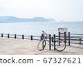 Cycling on the beach by bicycle 67327621