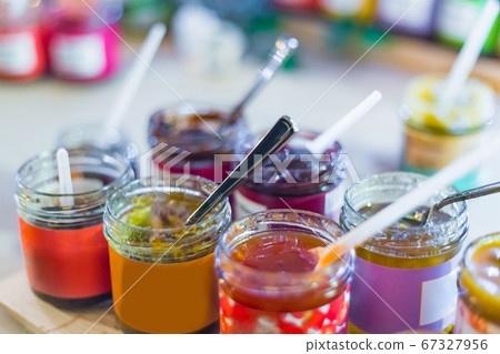 Delicious colorful jam, jelly or confiture in little glass jar 67327956