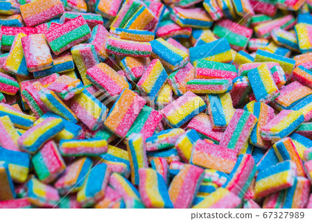 Assortment of colorful delicious marmalade jelly candies for sale on counter Assortment of colorful delicious marmalade jelly candies for sale on counter 67327989
