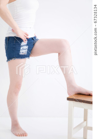 Woman in shorts Woman in shorts 67328134