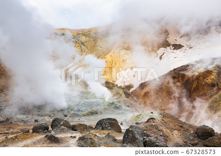 Volcanic landscape, crater of active volcano: hot spring, fumarole, lava field, gas-steam activity. Dramatic mountain landscape, travel destinations Volcanic landscape, crater of active volcano: hot spring, fumarole, lava field, gas-steam activity. Dramatic mountain landscape, travel destinations 67328573