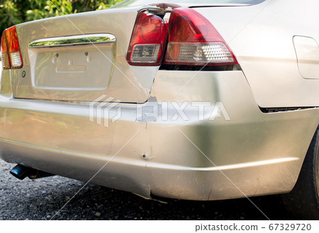Car rear light with bumper scrash and broken by accident on road,Car insurance concept 67329720