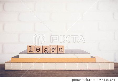 The word LEARN, letters and copy space background, 67330324