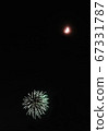 Moon and fireworks in the night sky 67331787