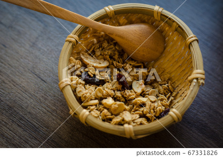 granola multigrain in basket. Healthy food. 67331826