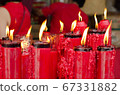 many redcandles burning flame 67331882