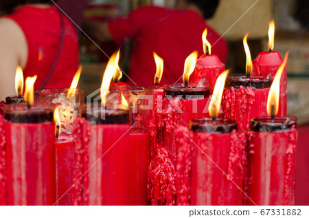 many redcandles burning flame 67331882