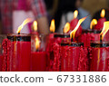 many redcandles burning flame 67331886