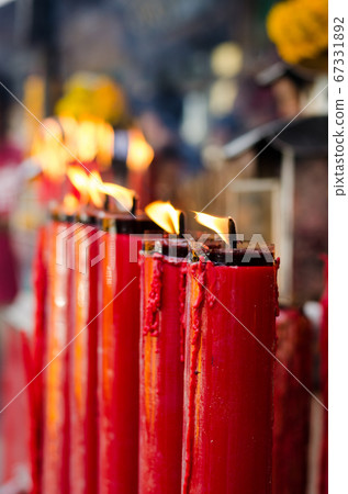 many redcandles burning flame 67331892