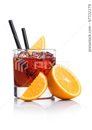 Negroni Cocktail in modern glass with ice cubes Negroni Cocktail in modern glass with ice cubes 67332279