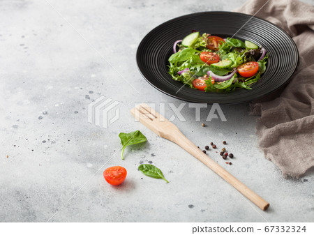 Healthy fresh vegetables salad with lettuce  67332324