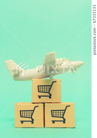 White model airplane lands on blue background from White model airplane lands on blue background from 67335131